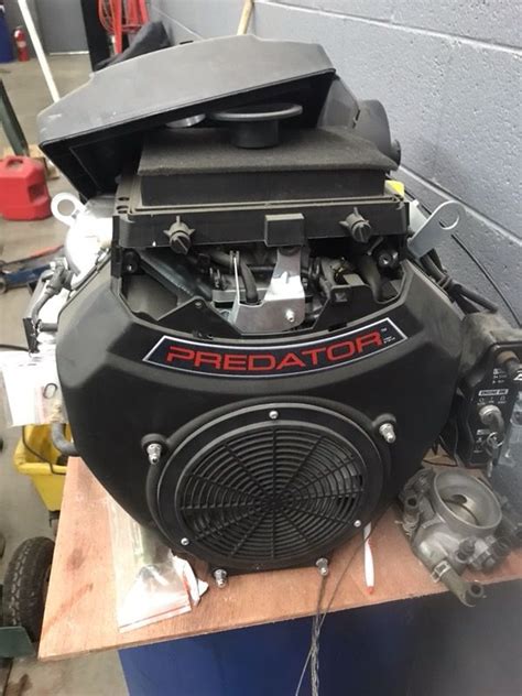 predator 670 in a skid steer|670cc predator engine aftermarket rebuilders.